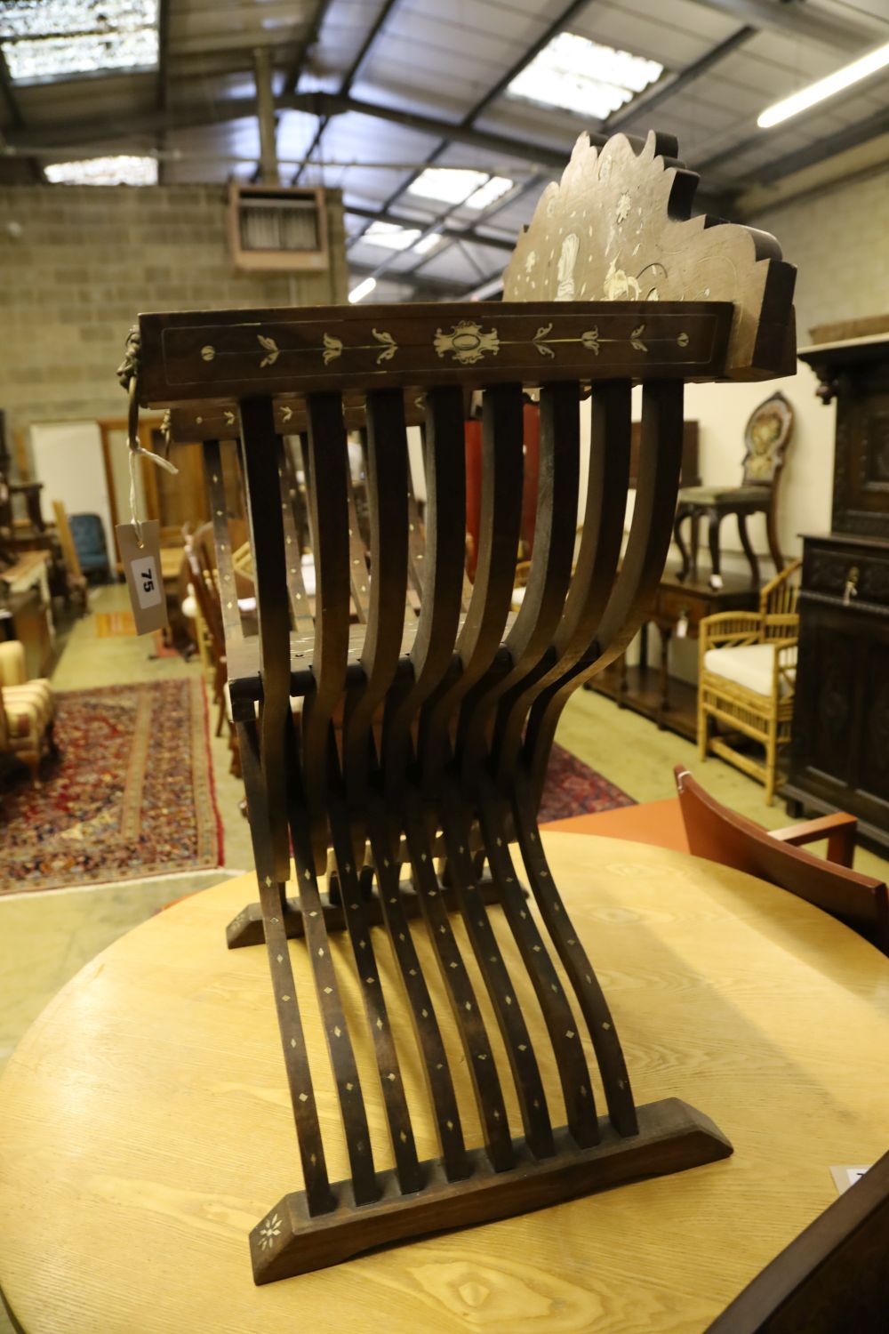 An Italian bone inlaid Savonarola chair, width 72cm